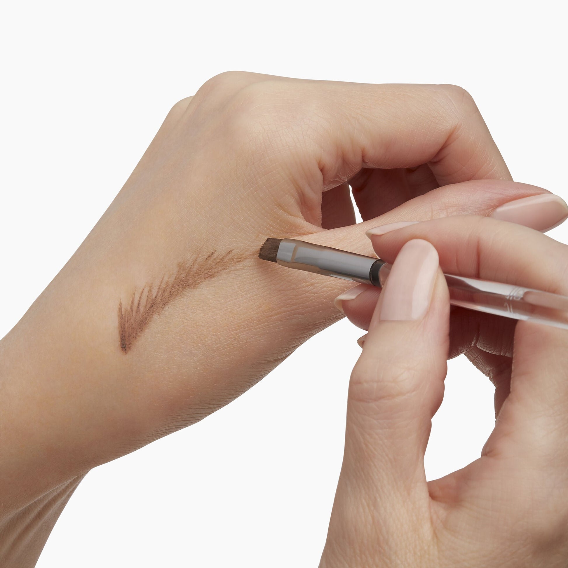 precision-dual-sided-eyebrow-brush-t9 85315_PrecisionDualSidedEyebrowBrush_Model_V2.jpg